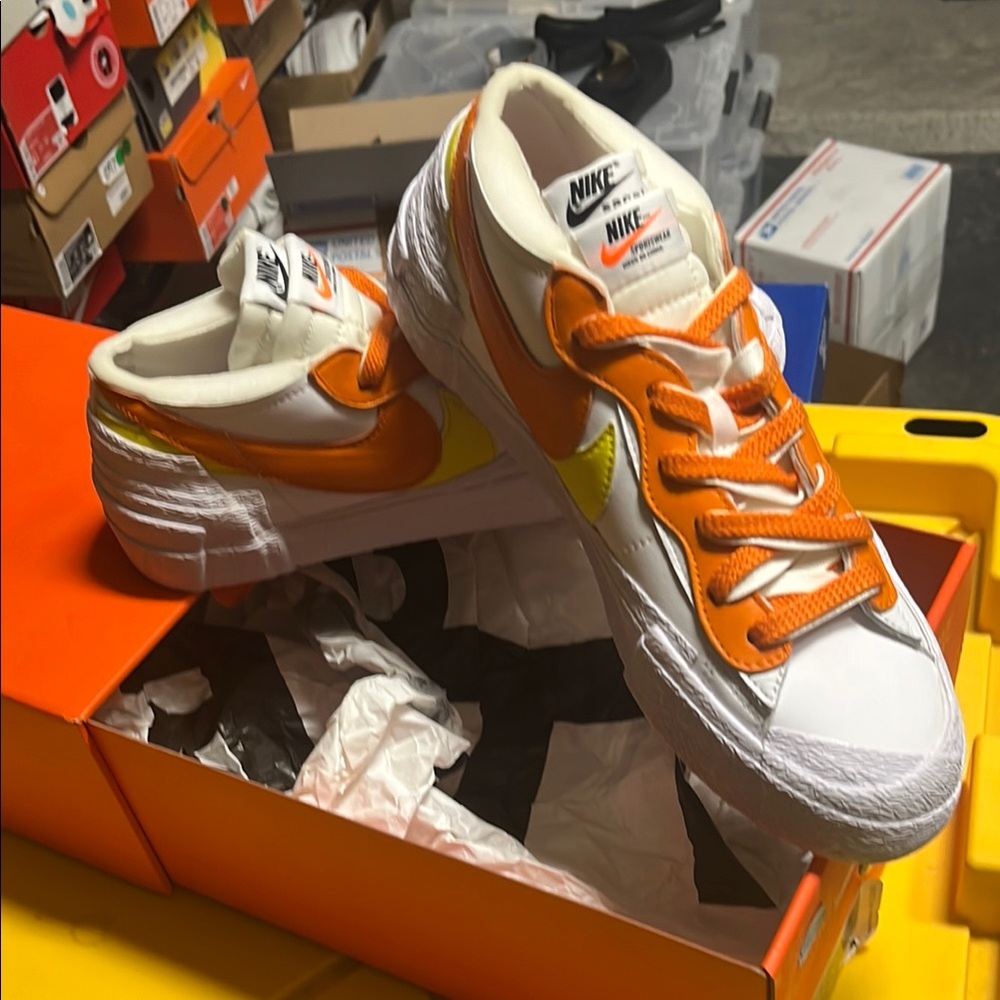 Nike Sacai Orange/White/Yellow Double Swoosh limited collaboration.